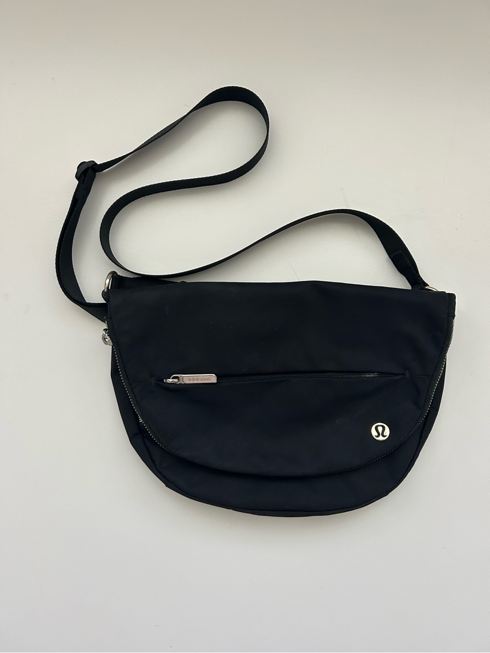 lululemon All Night Festival Bag 2L in black with gold hardware